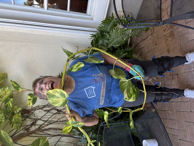 Laura enjoying a gardening project